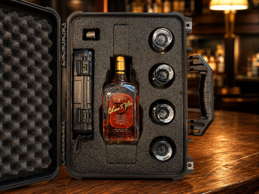 Bottle and glassware secured in the case