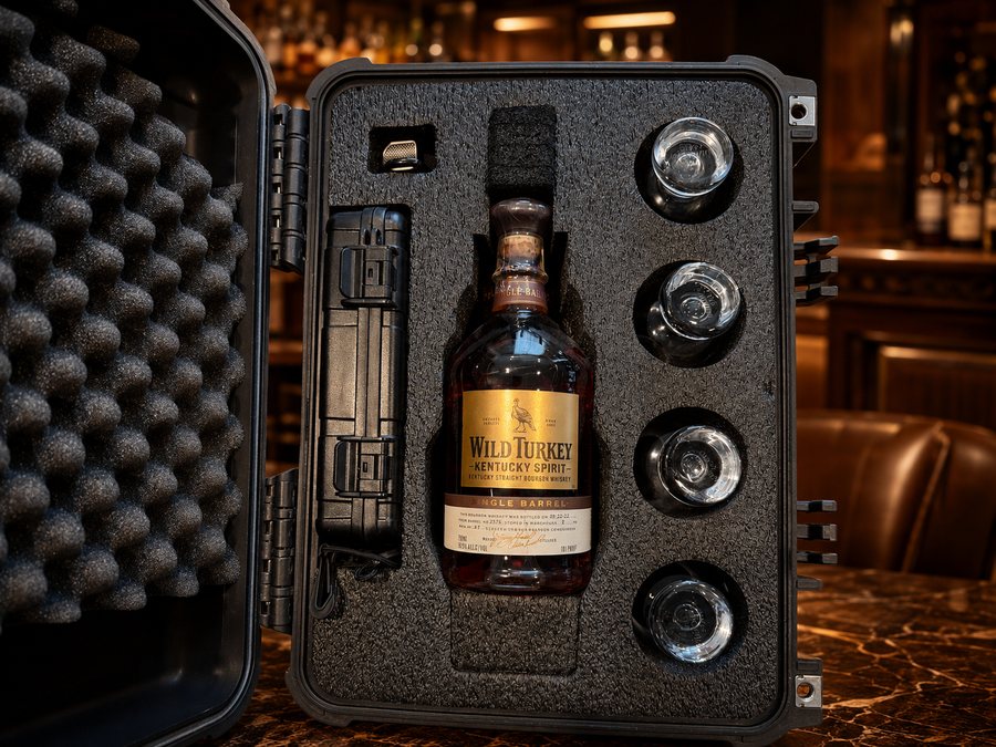 A bottle seated in the custom foam