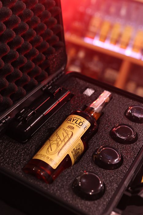 Barrel Vault case fitted with a whiskey bottle