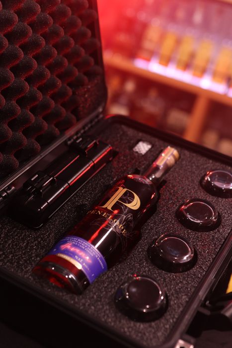 Barrel Vault case fitted with a whiskey bottle