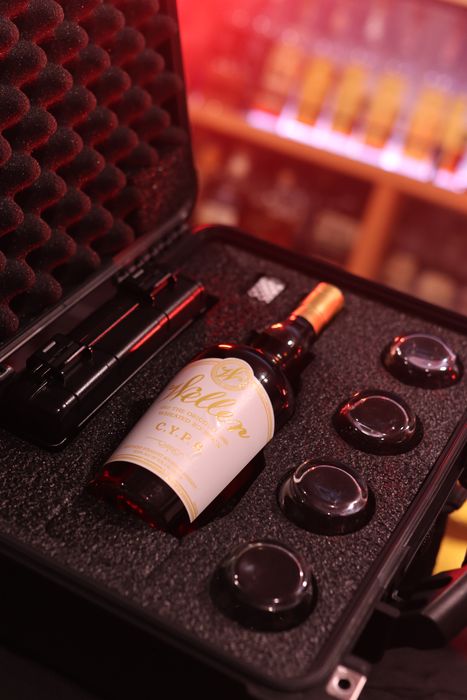 Barrel Vault case fitted with a whiskey bottle