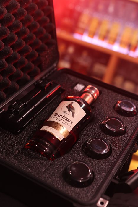 Barrel Vault case fitted with a whiskey bottle