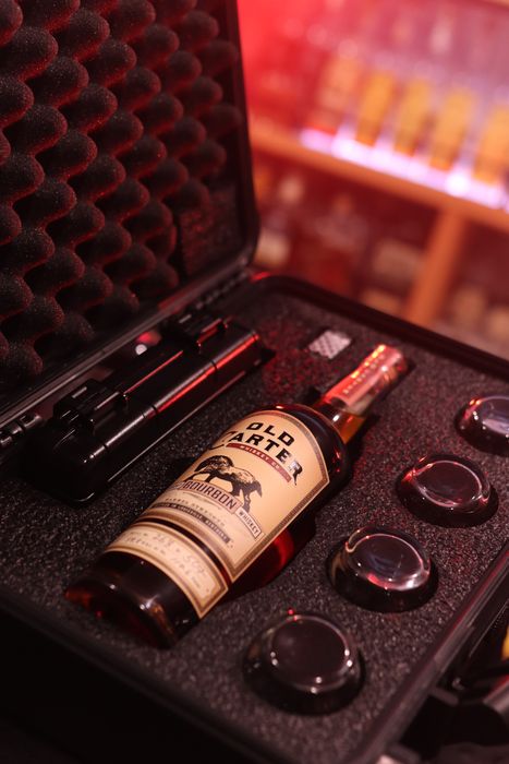 Barrel Vault case fitted with a whiskey bottle