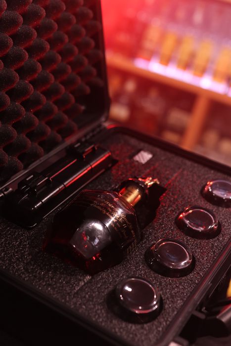Barrel Vault case fitted with a whiskey bottle
