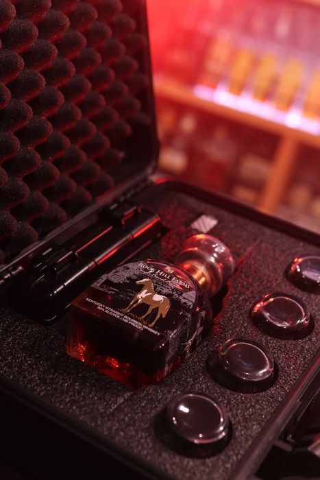 Barrel Vault case fitted with a whiskey bottle