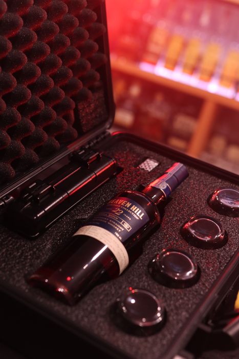 Barrel Vault case fitted with a whiskey bottle